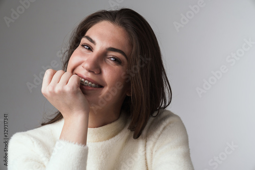 Happy beautiful young brunette woman