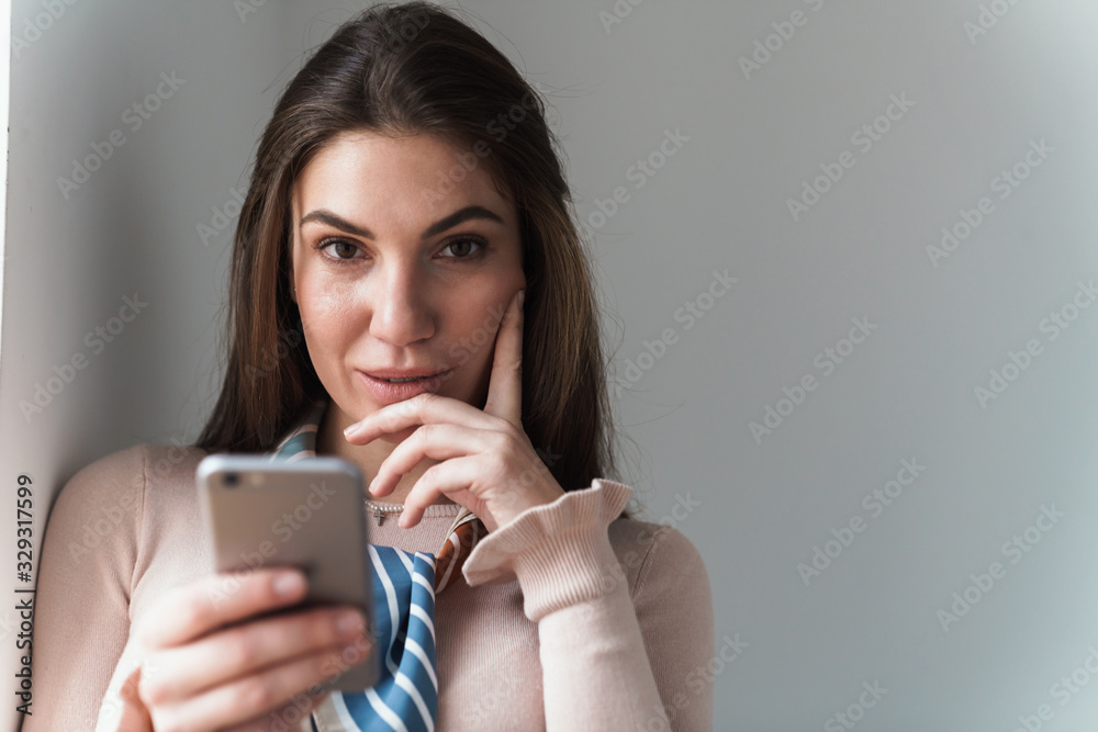 Concentrated beautiful young brunette woman Concentrated beautiful young brunette woman