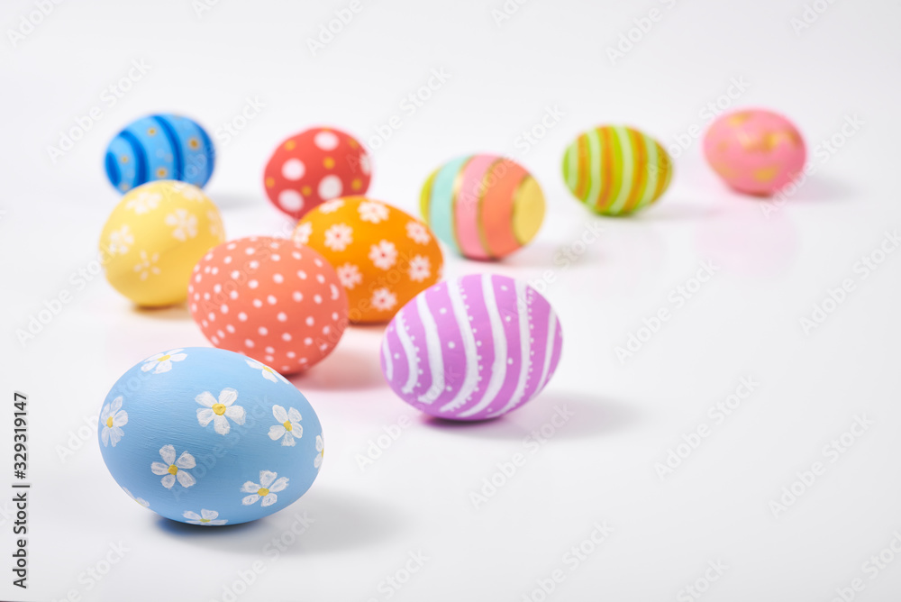 Top View. Creative layout  Easter paint colorful  Eggs various pattern handmade on isolated white background.copy space.