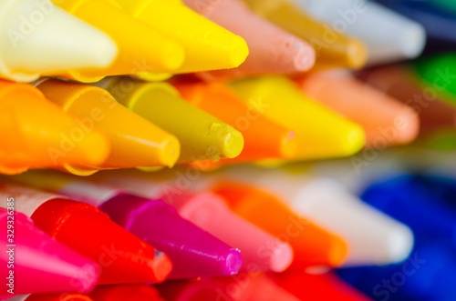 close up set mix color of crayons in the white box.selective focus shot