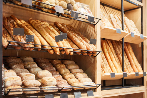 Bread and baguette and rolls in bakery photo