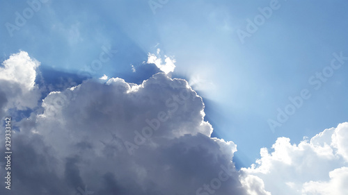 big clouds with sunbeams