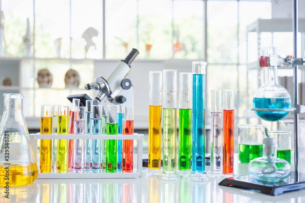 Various glass tubes and equipment used in scientific laboratories, on desks, in laboratories, try researching