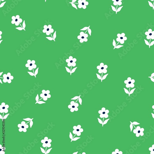 Simple floral seamless pattern with small abstract flowers on green background. Spring motif for fabric, home decor textile and fashion prints.