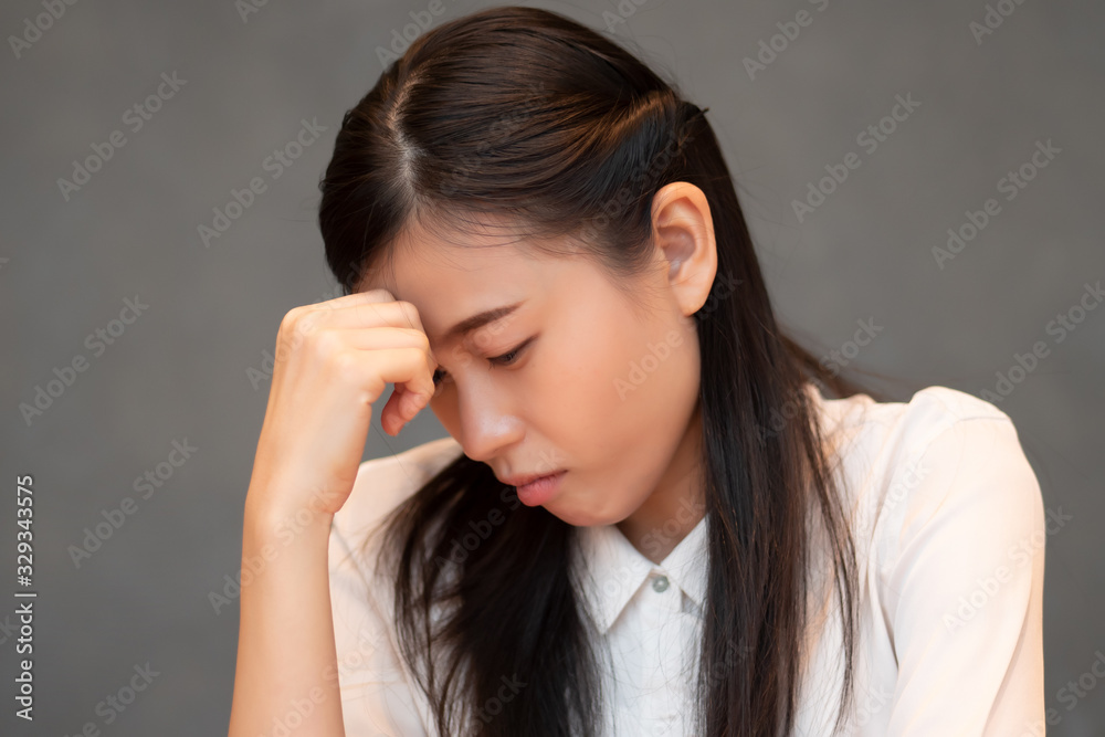 sick woman having fever or headache; concept of stress, depression, biohazard, biological hazard, health care, coronavirus outbreak, sickness, COVID-19, SARS-CoV-2 coronavirus sick woman having fever or headache; concept of stress, depression, biohazard, biological hazard, health care, coronavirus outbreak, sickness, COVID-19, SARS-CoV-2 coronavirus