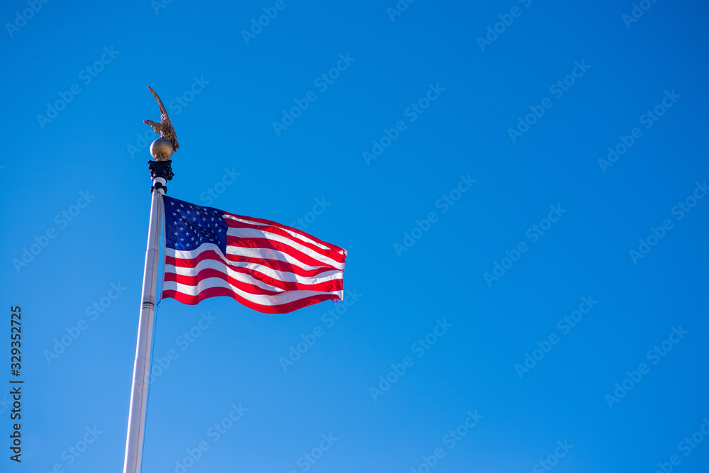 The flag of the United States of America blowing in the wind The flag of the United States of America blowing in the wind
