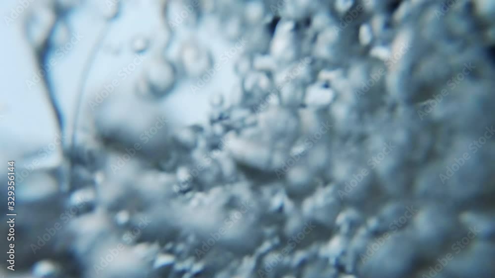 Water bubbles Close up. Slow motion video of air released from the water. Air bubbles floating from sea bottom to the water surface. Water bubbles Close up. Slow motion video of air released from the water. Air bubbles floating from sea bottom to the water surface.