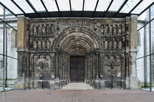 Regensburg, Germany. Schottenportal, the north portal of St. James Church of Scots Monastery. The portal was created in the 12th century simultaneously with the construction of the church. photo