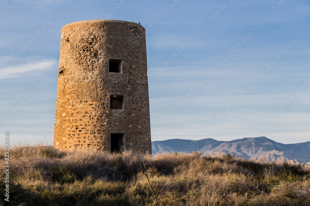 view of a Tower of Perdigal, Almeria distric, old fort tower on the coast, Almeria, Spain