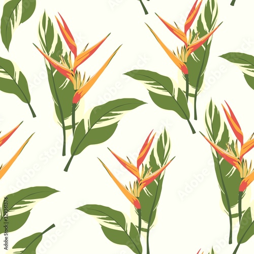 Seamless tropical pattern  vivid tropic foliage  with palm leaves  bird of paradise flower  heliconia in bloom. White background.