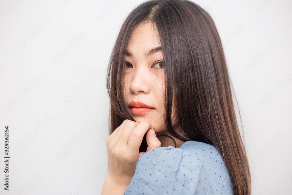 Beautiful smile asian young woman touching on hair with clean and fresh skin Happiness and cheerful with positive emotional on white background Beautiful smile asian young woman touching on hair with clean and fresh skin Happiness and cheerful with positive emotional on white background