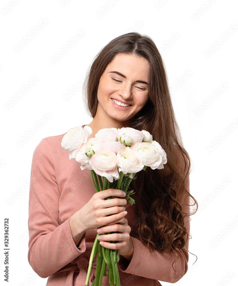Beautiful young woman with dark long hair with a bouquet of delicate flowers . Beautiful young woman with dark long hair with a bouquet of delicate flowers .