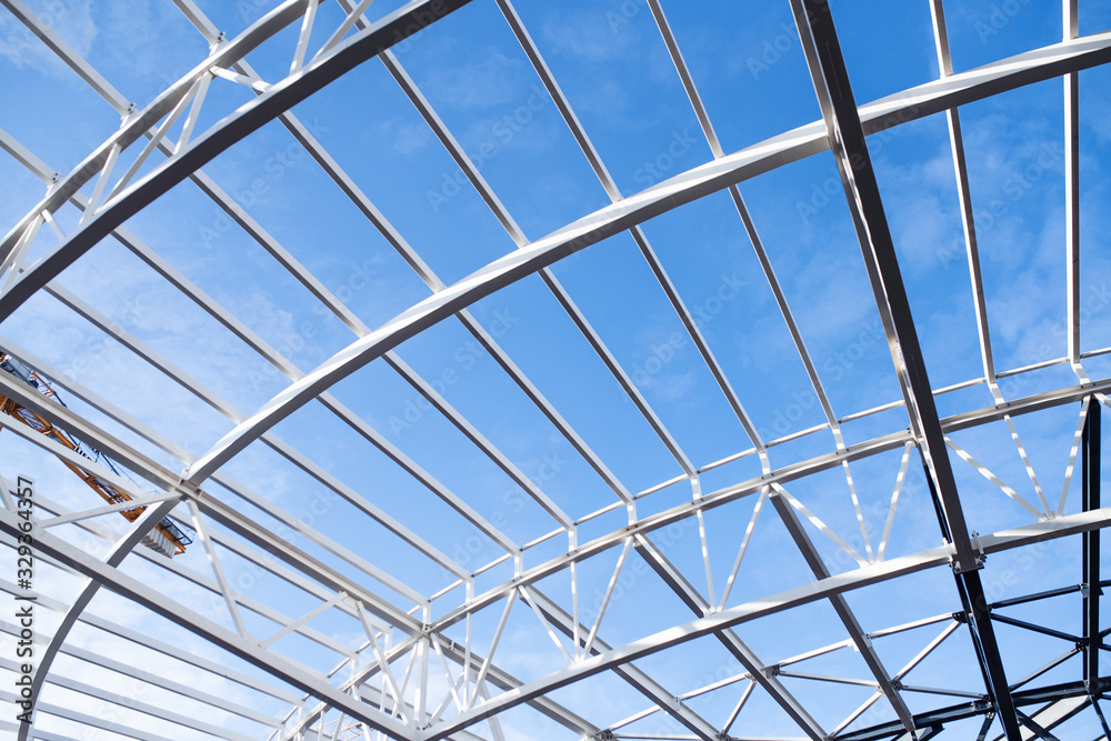 Fototapeta premium Construction site with a steel frame structures.