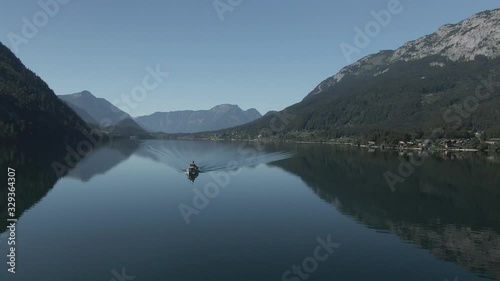 Wallpaper Mural POI aerial of ferry boat cruising on mirror calm mountain lake Torontodigital.ca
