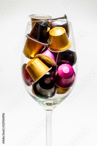 Glass cup with coffee capsules