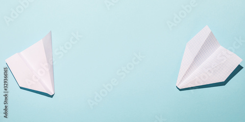 Two different paper airplanes. Right and wrong. High-quality and substandard. Crooked and straight. Two opposites