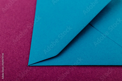 Colorful envelope on a purple background.
