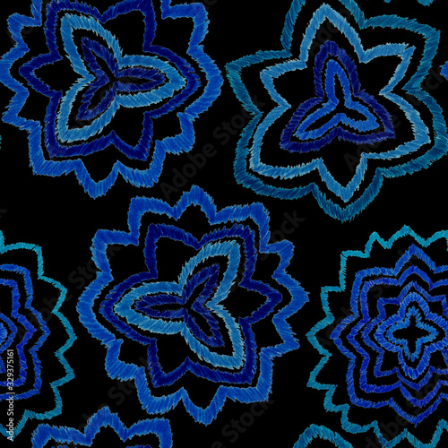 Creative seamless pattern with hand drawn ikat stars. Ethnic boho seamless pa...