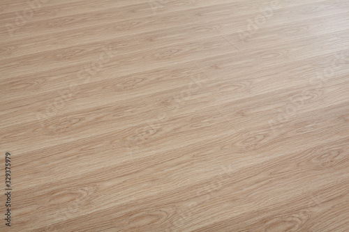 Wooden natural texture. New parquet blank. Wooden laminate floor boards background image. Home decor.