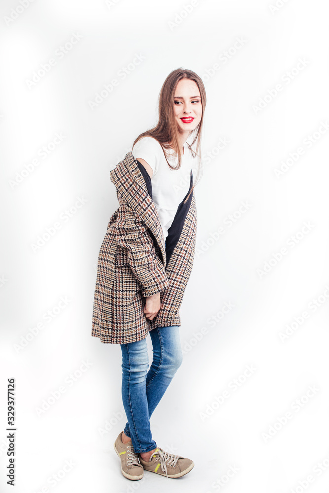 young pretty woman with brunette hair on white background isolated, sensual makeup, fashion look, lifestyle people concept young pretty woman with brunette hair on white background isolated, sensual makeup, fashion look, lifestyle people concept