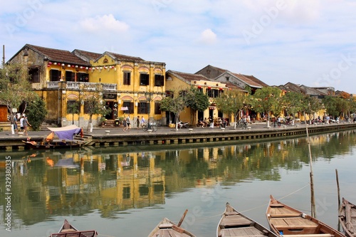 Iconical yellow chinese style shophouses at Hoi An, Vietnam photo