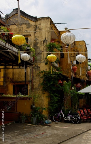 Traditional and iconical yellow houses at Hoi An, Vietnam photo