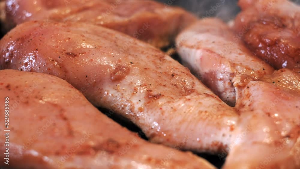 fried chicken breast on the grill. meat is good for muscle growth. proper nutrition for a bodybuilder fried chicken breast on the grill. meat is good for muscle growth. proper nutrition for a bodybuilder