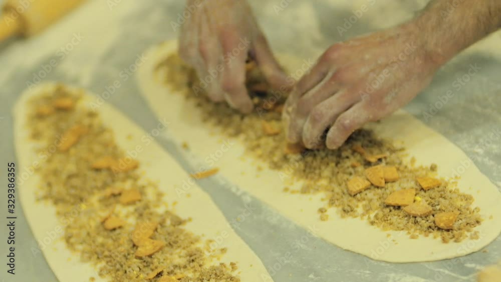 The cook prepares the Turkish style pita. Puts the inner ingredients of the pita. The cook prepares the Turkish style pita. Puts the inner ingredients of the pita.