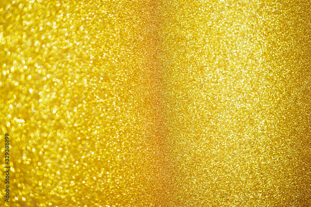 Abstract gold glitter sparkle with bokeh light background