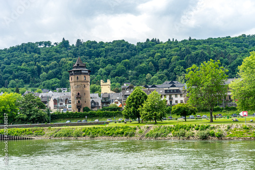 Fototapeta Naklejka Na Ścianę i Meble -  Germany, Rhine Romantic Cruise, a castle on top of a lake surrounded by green grass and trees