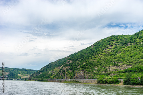 Germany, Rhine Romantic Cruise, a body of water with a mountain in the background