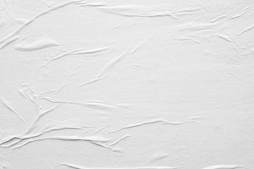 Blank white crumpled and creased paper poster texture background