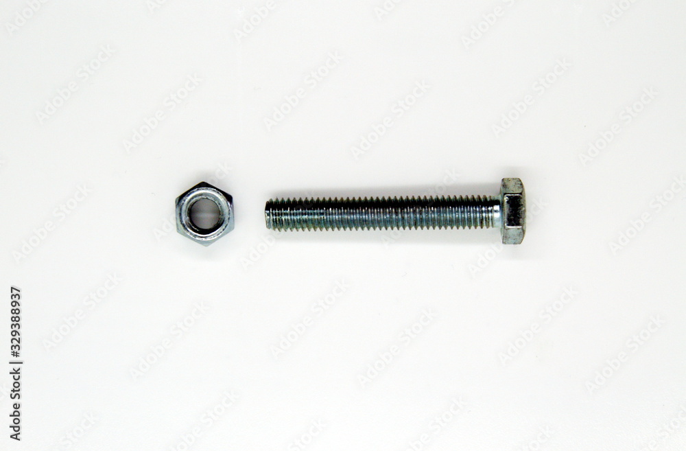 screw and nut on a white background screw and nut on a white background