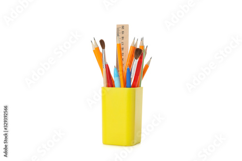 Foto Stationery in holder isolated on white background