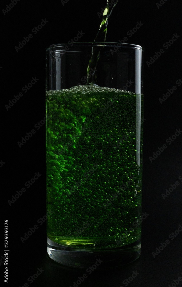 glass of water with ice and mint isolated on white glass of water with ice and mint isolated on white
