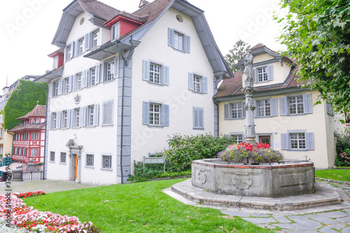 Lucerne, swiss city on the lake, in a cloudy day photo