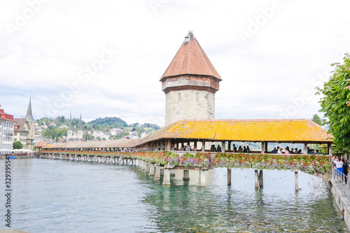 Lucerne, swiss city on the lake, in a cloudy day photo