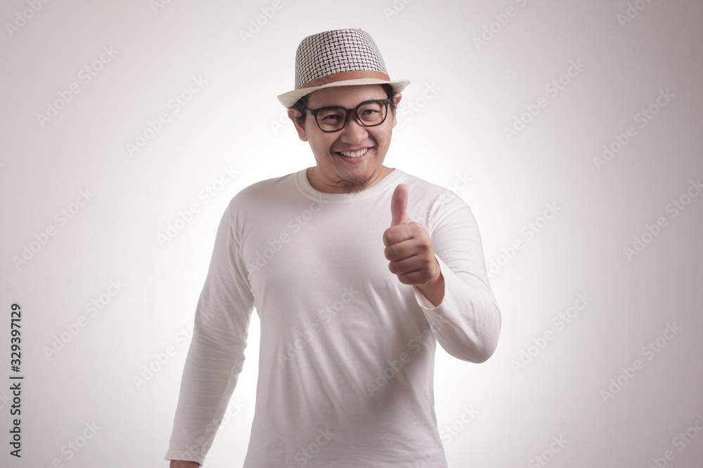 Young Man Showing Thumbs Up Gesture OK Sign Young Man Showing Thumbs Up Gesture OK Sign