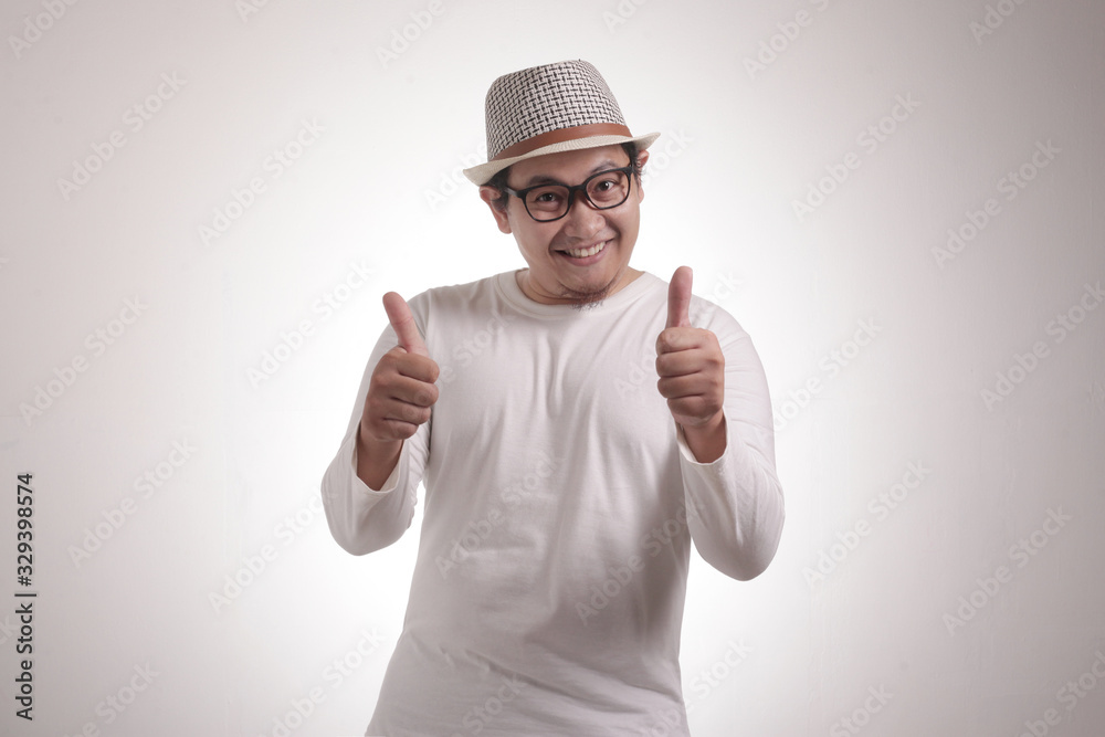 Young Man Showing Thumbs Up Gesture OK Sign Young Man Showing Thumbs Up Gesture OK Sign
