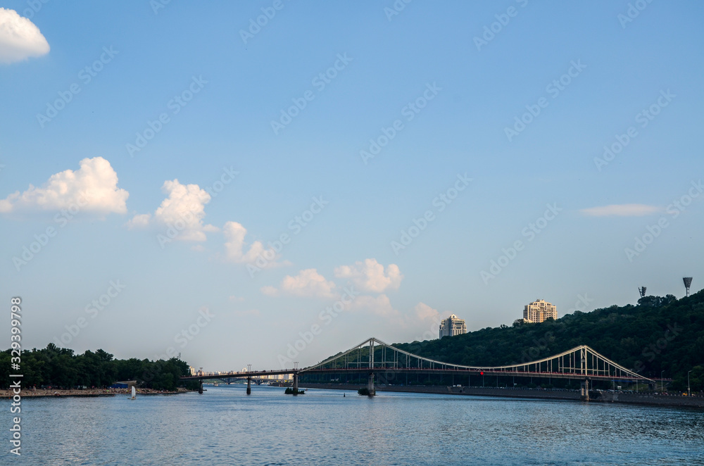 The Pedestrian Bridge across the Dnipro river to Trukhaniv island in Kyiv, the capital of Ukraine 