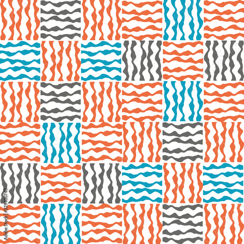 Vector plaid fabric weave seamless pattern background. Small orange, blue, gray squares geometric cloth backdrop. Irregular repeat cotton effect with interlocking weave. Woven all over print.