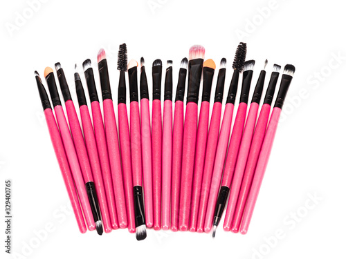 Various makeup brushes isolated on a white background