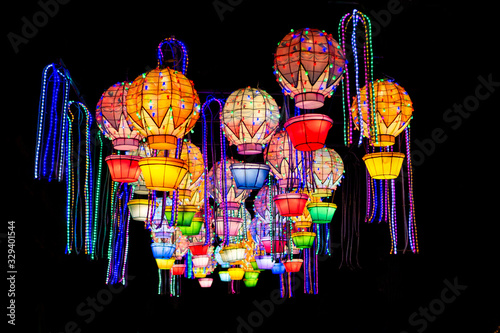 The colored lights shine on the Chinese feast, which is in the shape of a balloon