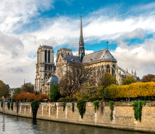 Beautiful Notre-Dame de Paris cathedral with a Gothic spire several month before the fire in colorful autumn season, Paris, France