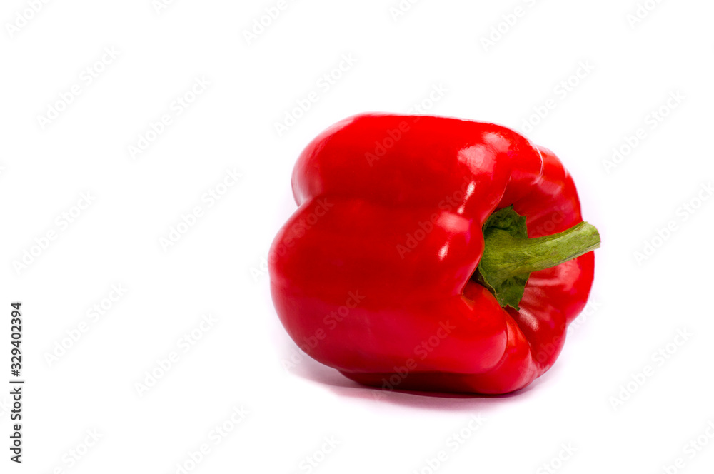 the concept of a healthy lifestyle. vegetarianism, delicious red pepper vegetables on a white background. diet, fitness, health the concept of a healthy lifestyle. vegetarianism, delicious red pepper vegetables on a white background. diet, fitness, health