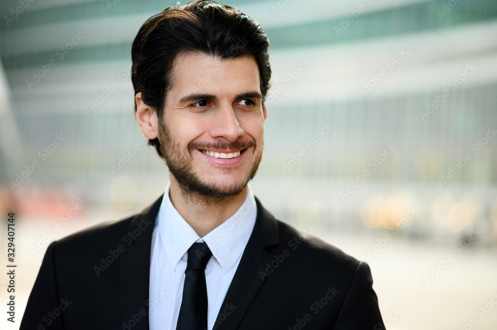 Young businessman outdoor smiling confidently Young businessman outdoor smiling confidently