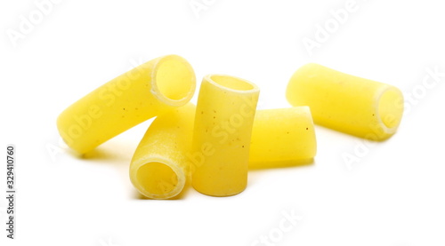 Uncooked smooth short tubes shape pasta also known as tubetti lisci isolated on white background