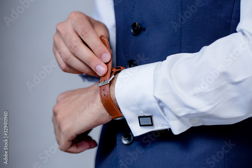 Businessman looking at his watch | Man hands and clock | Groom Wearing Watch