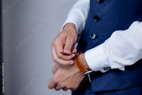 Businessman looking at his watch | Man hands and clock | Groom Wearing Watch