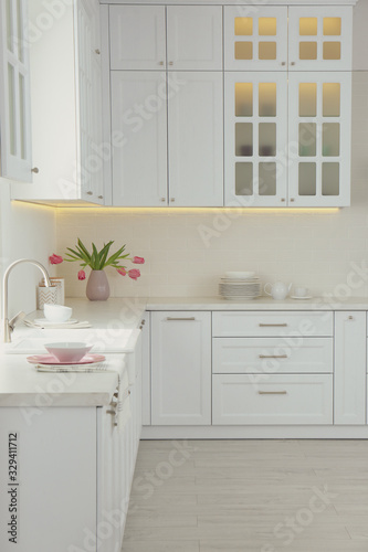 Fototapeta Naklejka Na Ścianę i Meble -  Beautiful kitchen interior with new stylish furniture